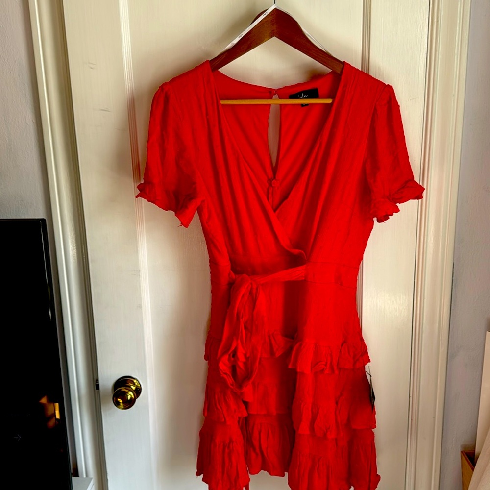 Cute V-neck red dress with ruffled skirt